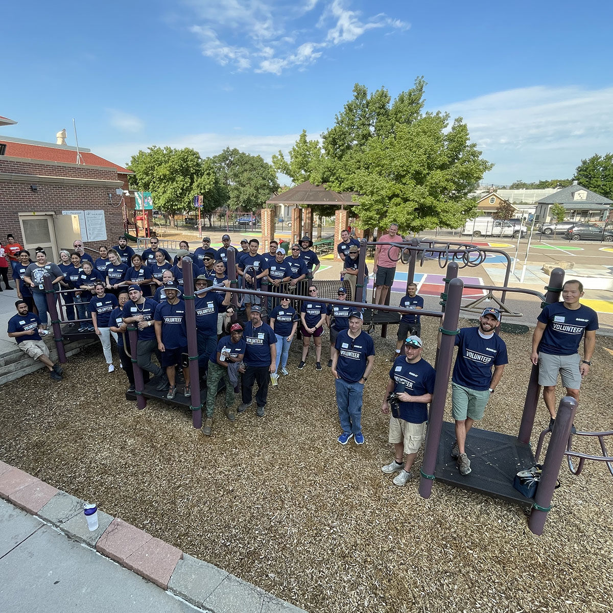 In partnership with the Mile High United Way, more than 75 BAND-IT employees volunteered to clean up gardens, play areas, and fields at Garden Place Elementary School in the Elyria-Swansea neighborhood of Denver.